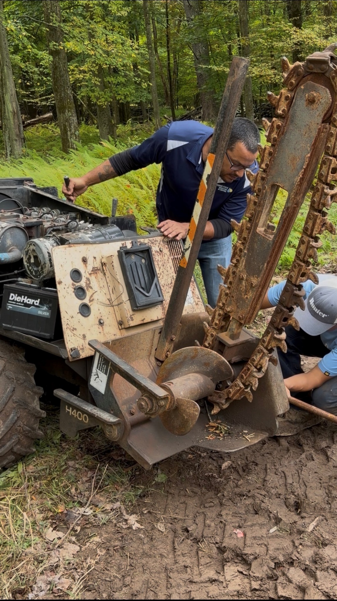 Garden State crew working on irrigation installation equipment